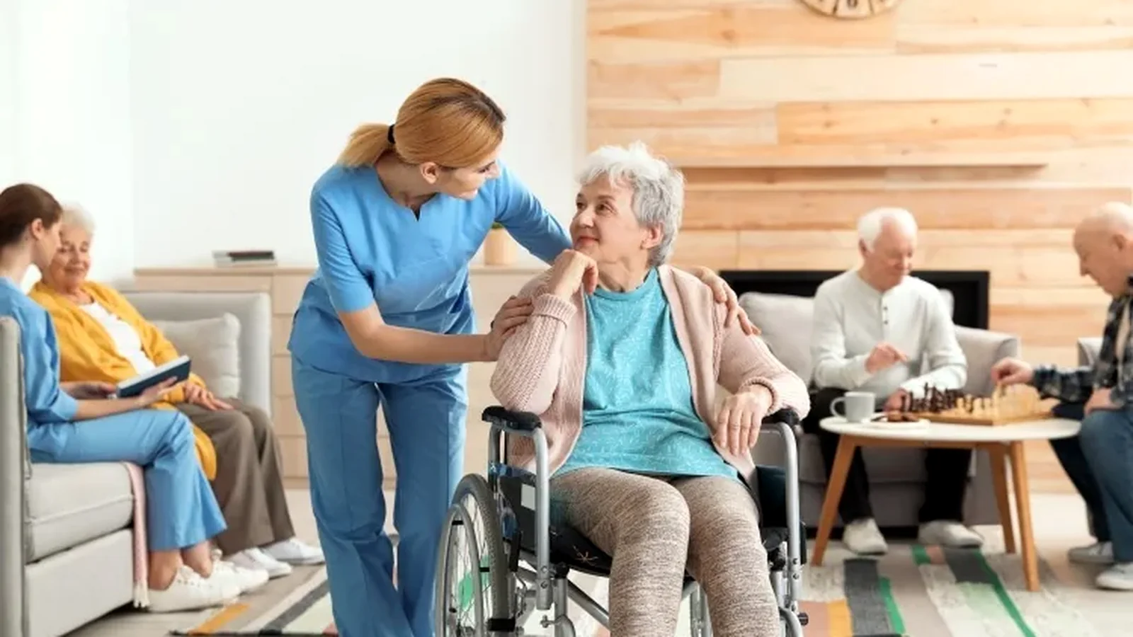 Family reviewing nursing home care concerns with an older resident