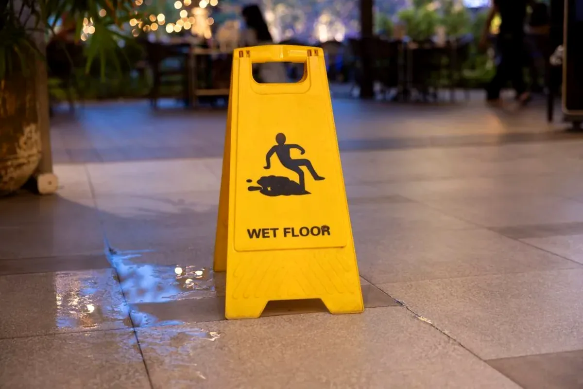 Wet floor hazard documented for a slip and fall claim