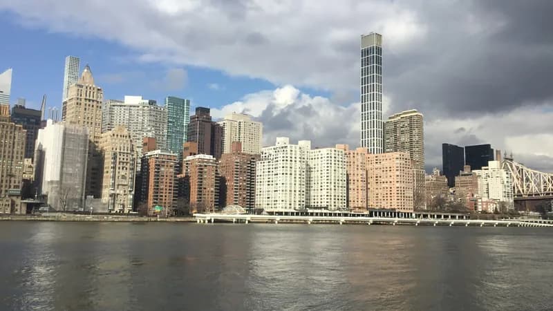 The East Side of Manhattan seen across the East River from Roosevelt Island, with the Queensboro Bridge at right.