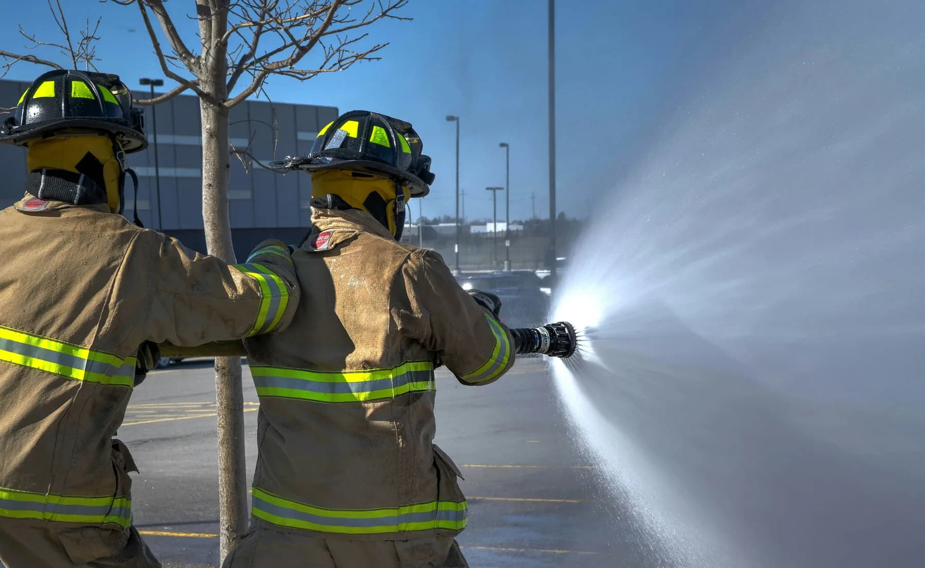 Firefighters responding to a burn injury emergency scene