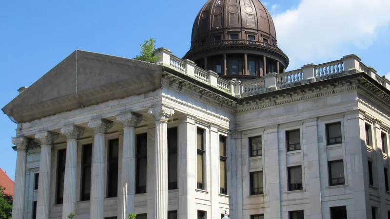The columned front and copper dome of the Passaic County Court House in Paterson, New Jersey.