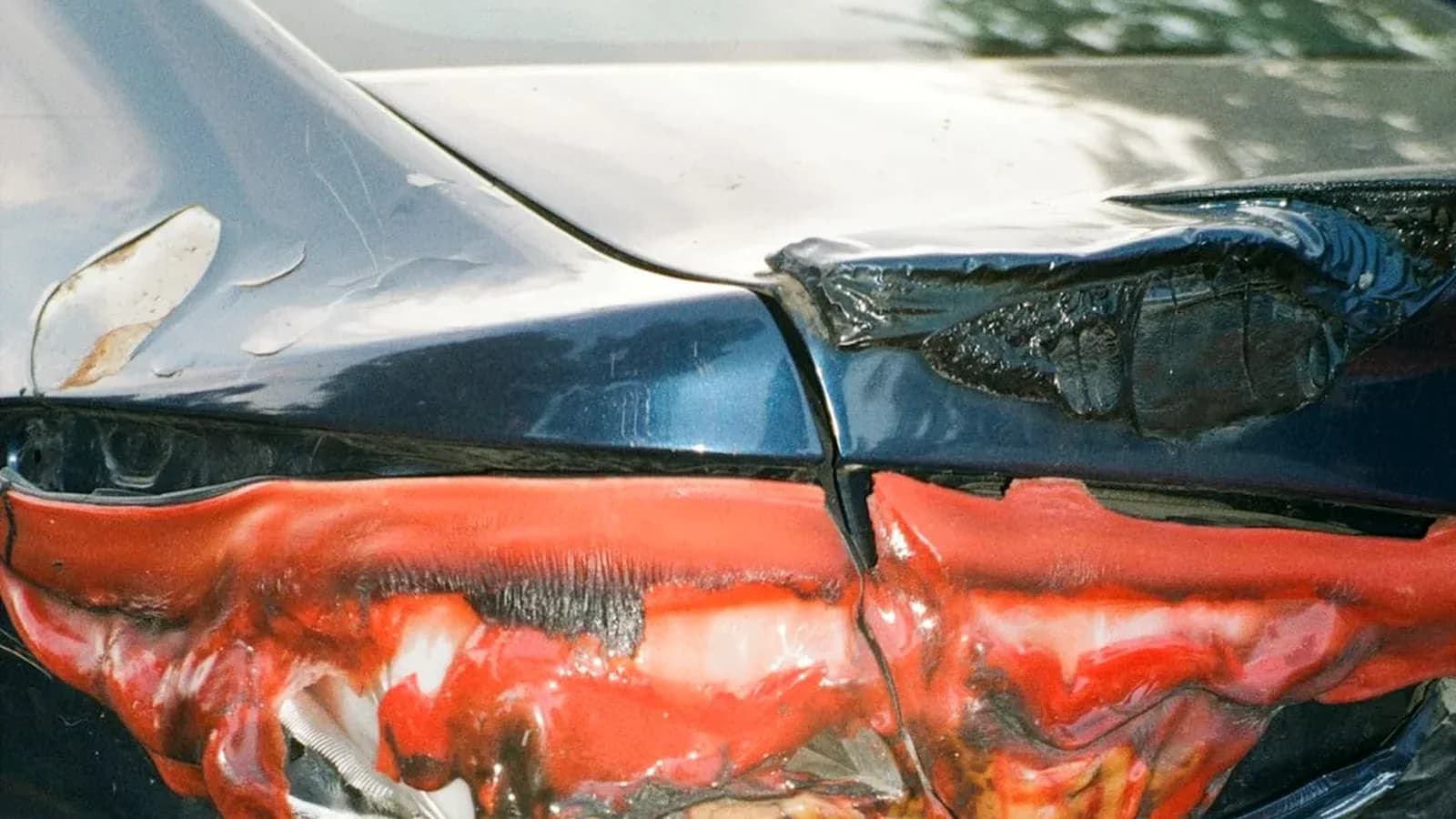 New York auto accident investigation with damaged vehicle evidence
