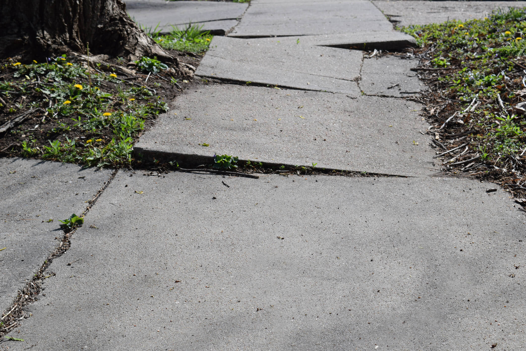 Trip and fall sidewalk uneven pavement accident injury lawyer New York